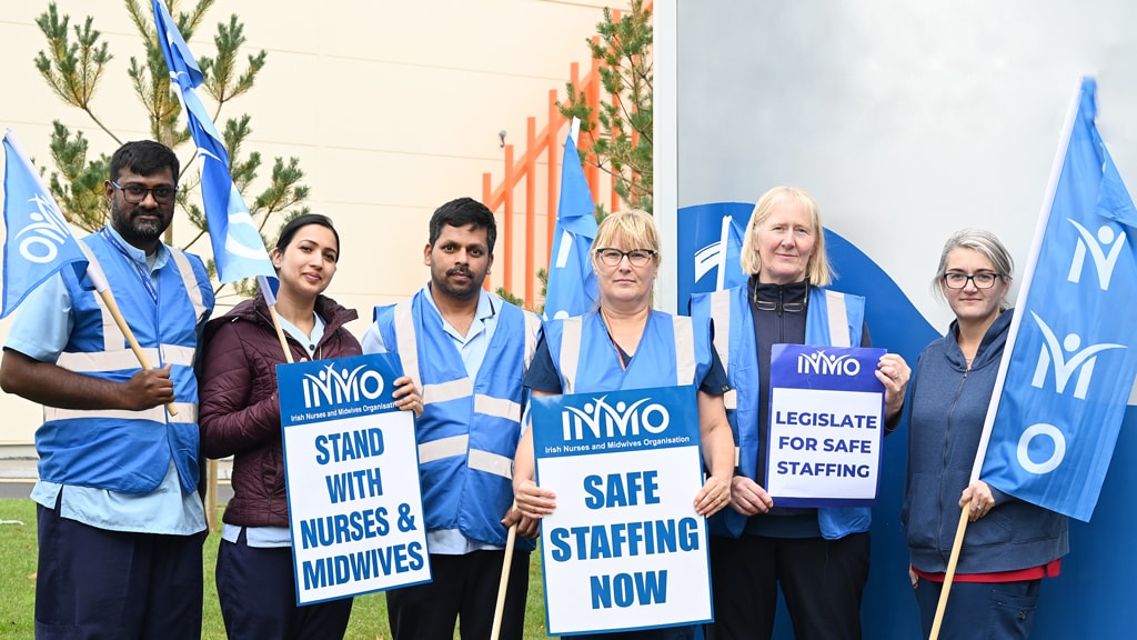 Naas nurses holding safe staffing sign at hospital protest